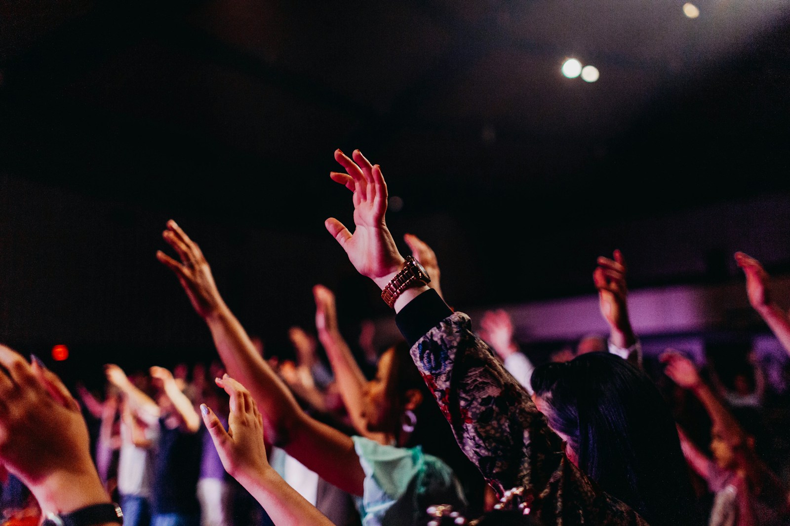 Raised hands during worship